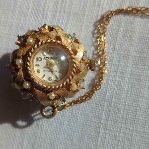 Sperina antimagnetic Swiss made pendant watch with gems and pearls gold tone